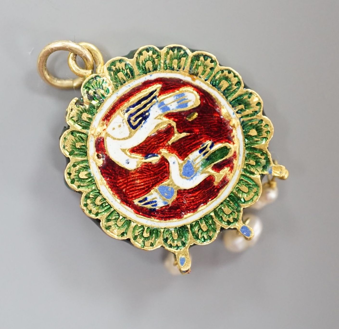 An Indian yellow metal, turquoise, baroque pearl and enamel set drop pendant, overall 33mm.